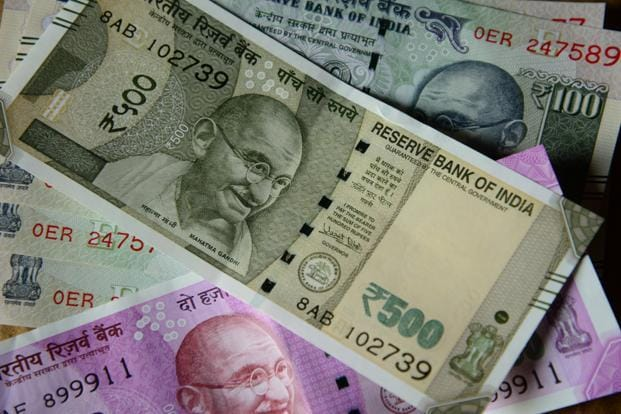 Indian Rupee Hits Lifetime Low Amid Speculative and Corporate Flows